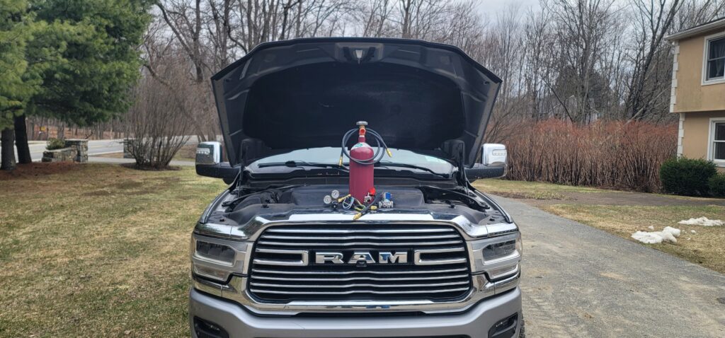 JTM RDS system mounted in RAM diesel truck with hood open