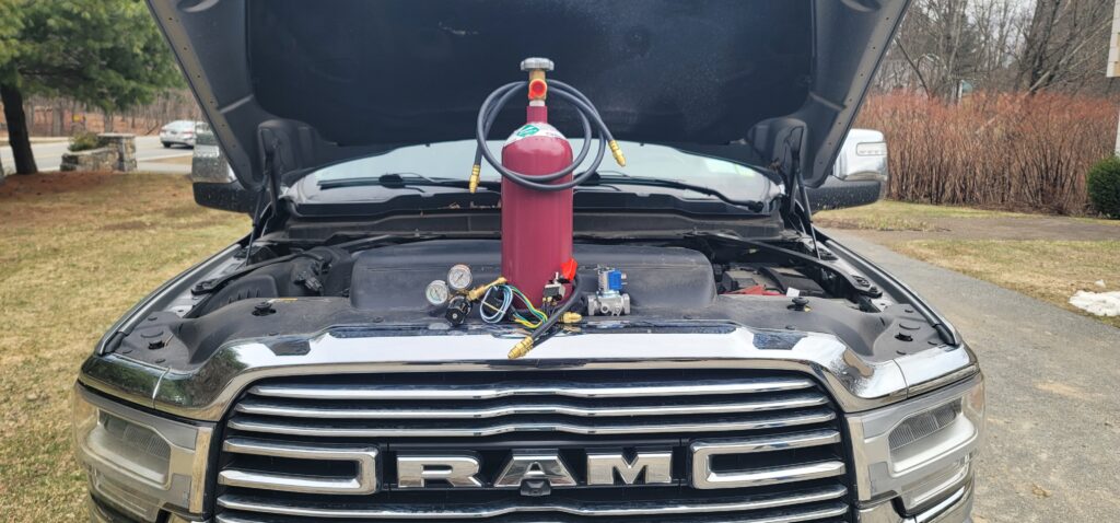 JTM Runaway Diesel Suppressor installed on a RAM truck engine bay
